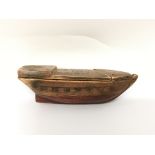 A wooden snuff box in the form of a boat, enscribe