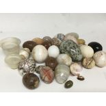 A collection of polished egg shaped stone and mine