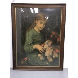 A framed and glazed portrait print of a young girl