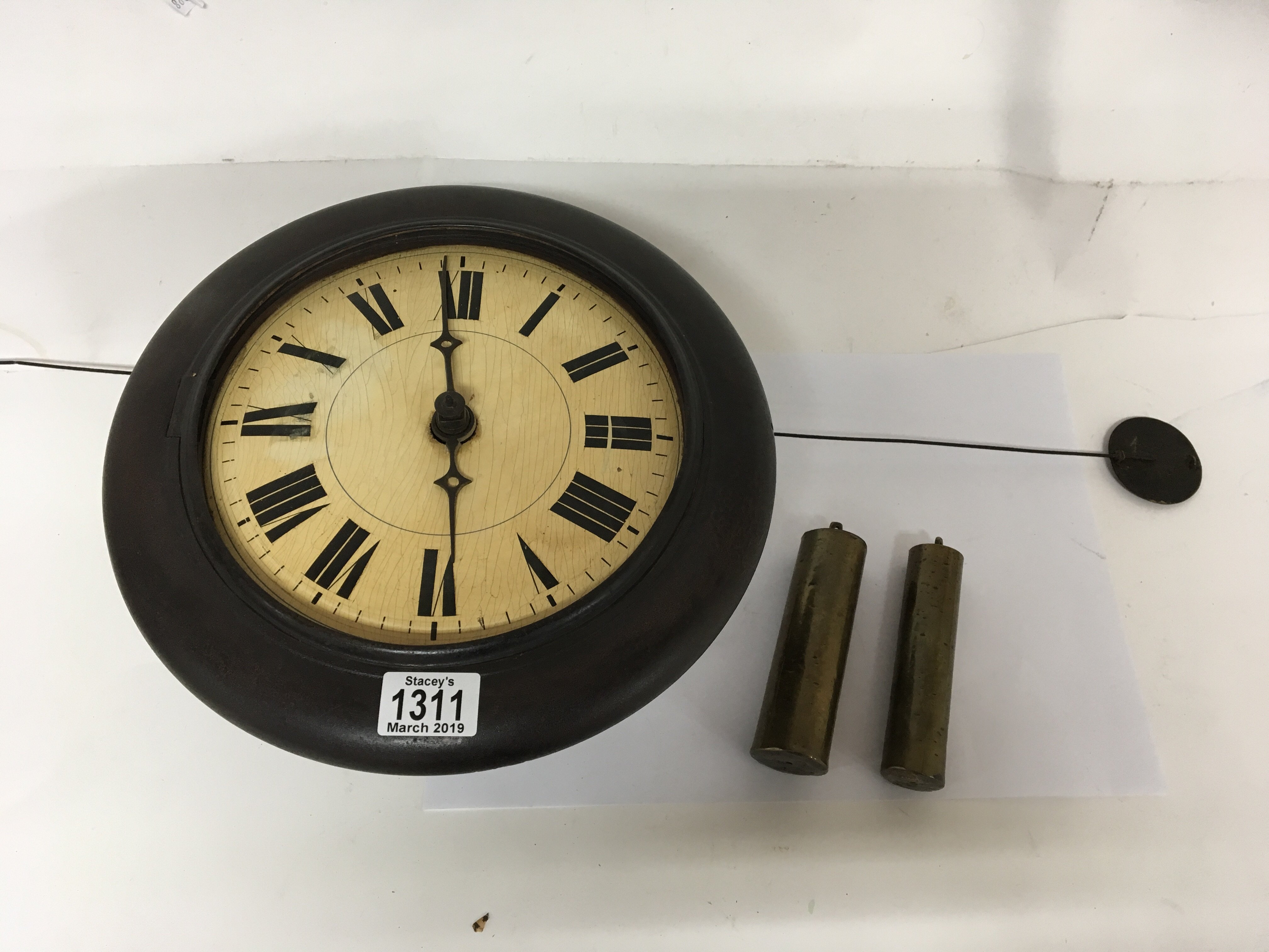 A Victorian postman’s alarm clock with a painted w