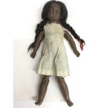 A Simon Halbig bisque Indian doll.Approx 41cm long