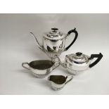 A four piece silver plated teaset with gadrooned d
