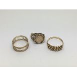 Three gold rings including a coin ring, approx 7.5
