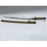 An Asian cewmonial sword in a sheath, likely Chine