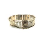 A decorative 9ct gold two tone bracelet with recta