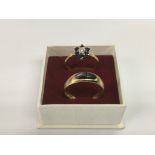 Two gold rings, one 18ct example set with stones a