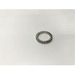 An unmarked white metal diamond ring. Weight appro