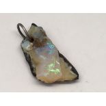 A piece of uncarved opal, approx 3cm long