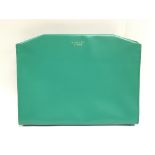 A Radley handbag in green, as new with tags and ou