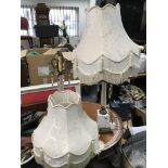A pair of marble and glass lamps with glass drops