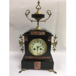 A marble 8 day mantle clock with gilt decoration,