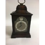 A mahogany case natal clock the brass dial with Ro