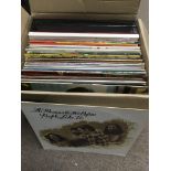 A box of various LPs including The Beatles, Long J