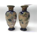 A pair of Doulton vases. Height approx 30cm