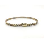 A 9ct gold three tone bracelet, total weight appro