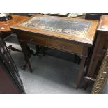 An Edwardian inlaid mahogany leather lined desk wi