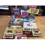 Collection of boxed diecast vehicles including cor