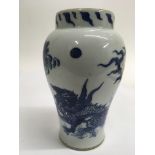 A Chinese blue and white vase painted with a drago