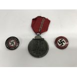 A group of German WW2 Nazi medals and badges to in