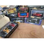 A collection of boxed diecast vehicles including B
