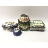 Four enamelled porcelain boxes including a cylindr