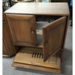 An Ercol television cabinet.Approx 52x85x95cm high