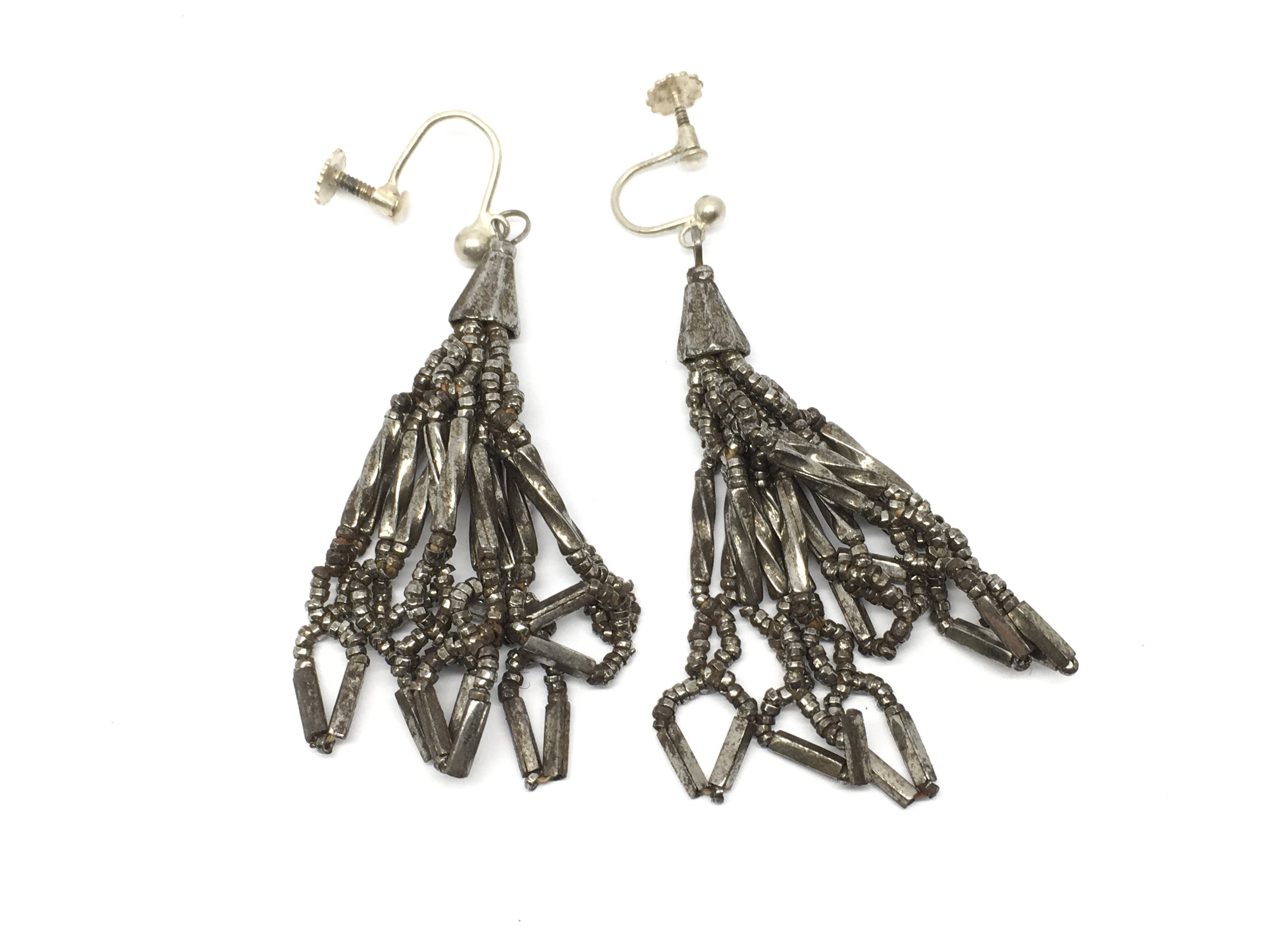 A pair of Victorian cut steel earrings with screw