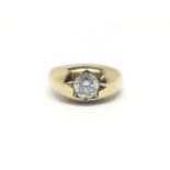 A gents large 9ct gold gypsy style ring set with a