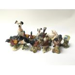A collection of ceramic animals to include Beswick