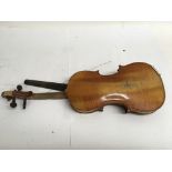 A cased violin 32 cm button to back