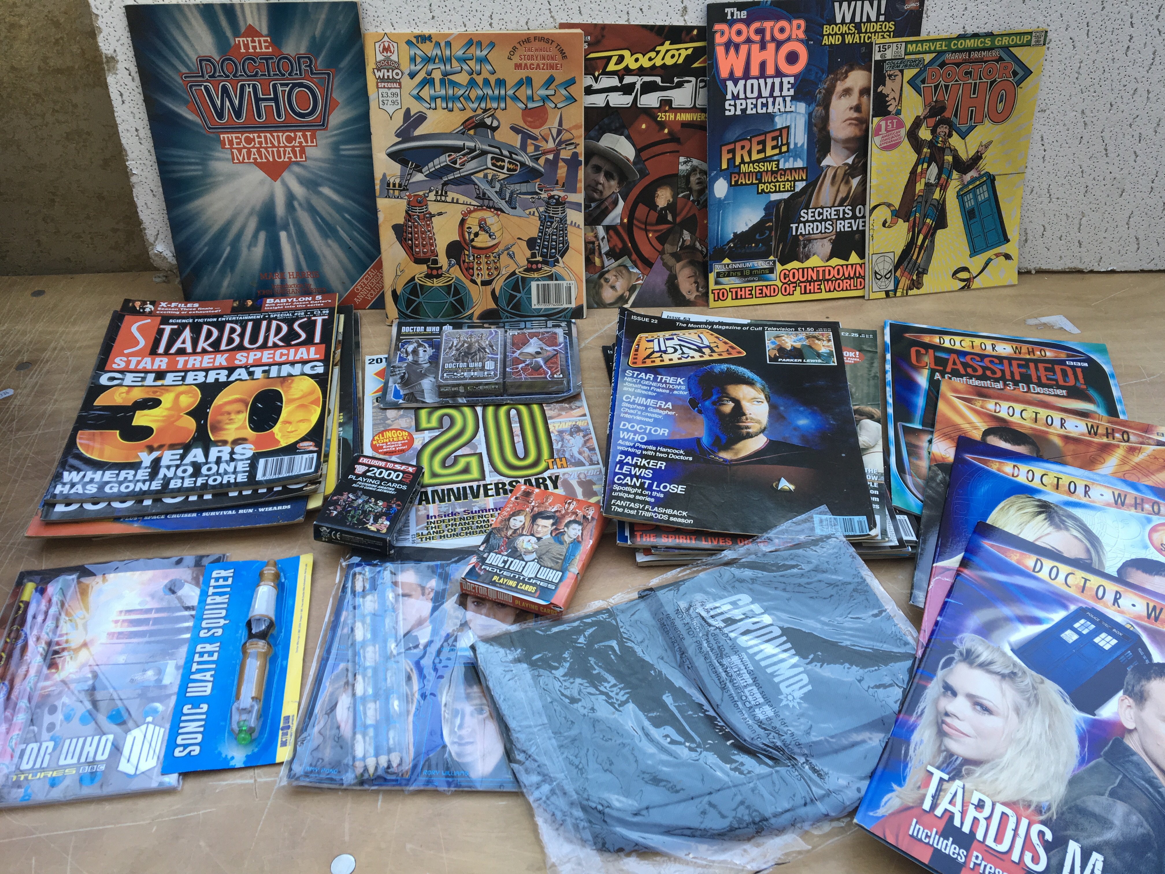 A collection of comics and magazines including TV