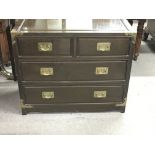 A Chinese style chest of drawers with two short an