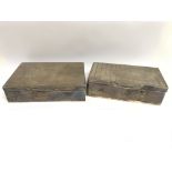 Two silver cased cigar boxes with wooden interior.