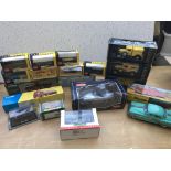 A collection of boxed diecast vehicles including V