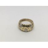 A 9ct gold ring set with small diamonds, approx 5g