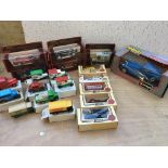 A collection of boxed diecast vehicles including L