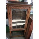 A glass front Edwardian display cabinet. Approx 29