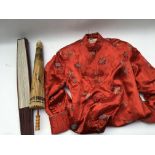 A group of items to include a red silk Chinese gow