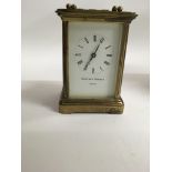 A brass case carriage clock Matthew Norman the dia