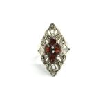 A silver, marcasite and garnet ring, total weight