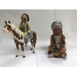 A pair of Native American/Indian figures including