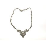 A vintage silver marquisite ribbon tie necklace. T