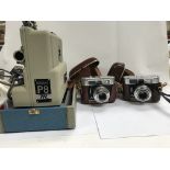 A group of 3 camera including a Voigtlander CL, CL