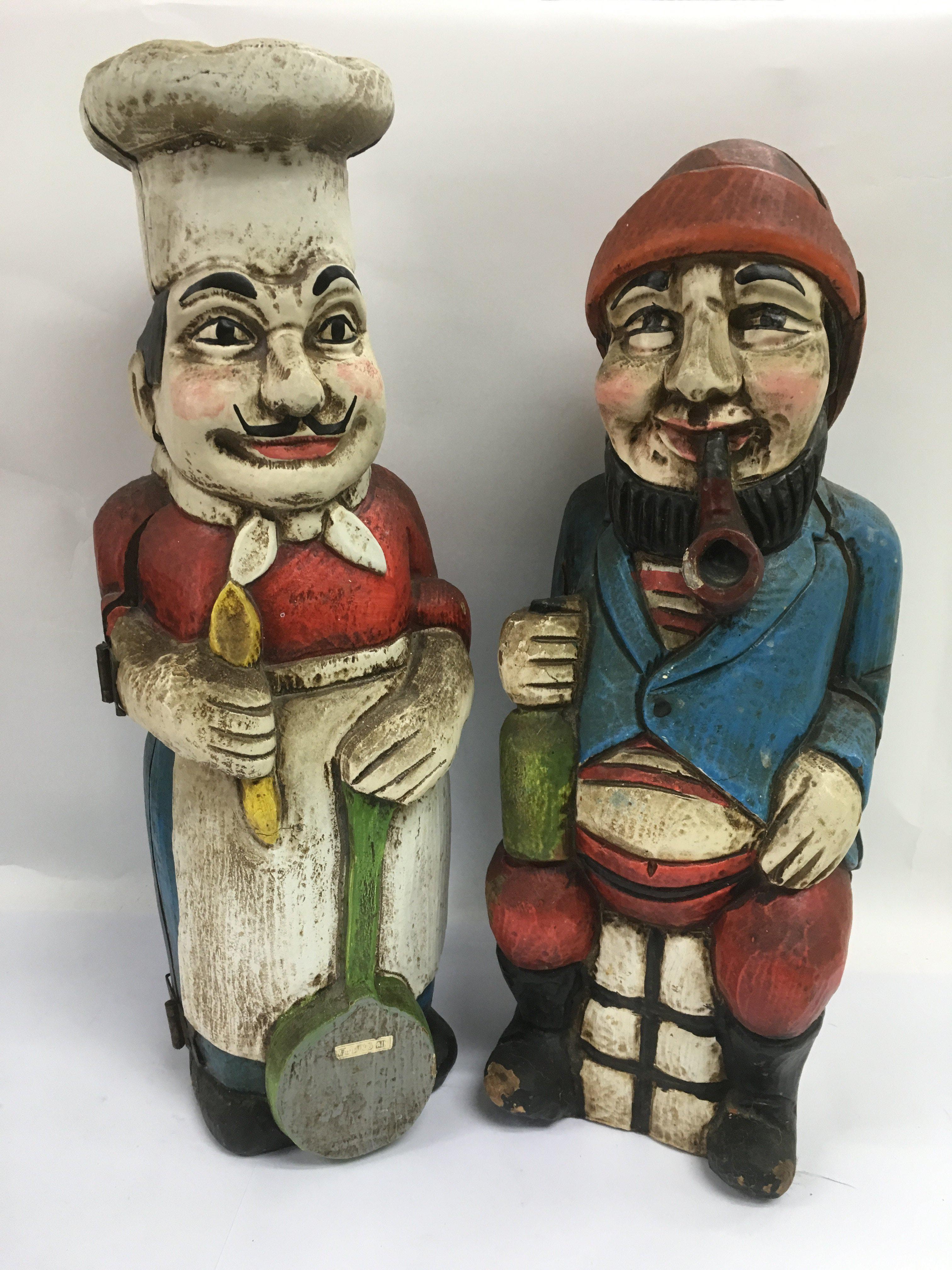 Two vintage carved wood caricature wine bottle hol