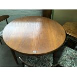 A modern design circular extending dining table an