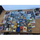 A collection of trading cards including Batman, An