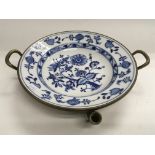 A Meissen blue and white hot plate, approx diamete