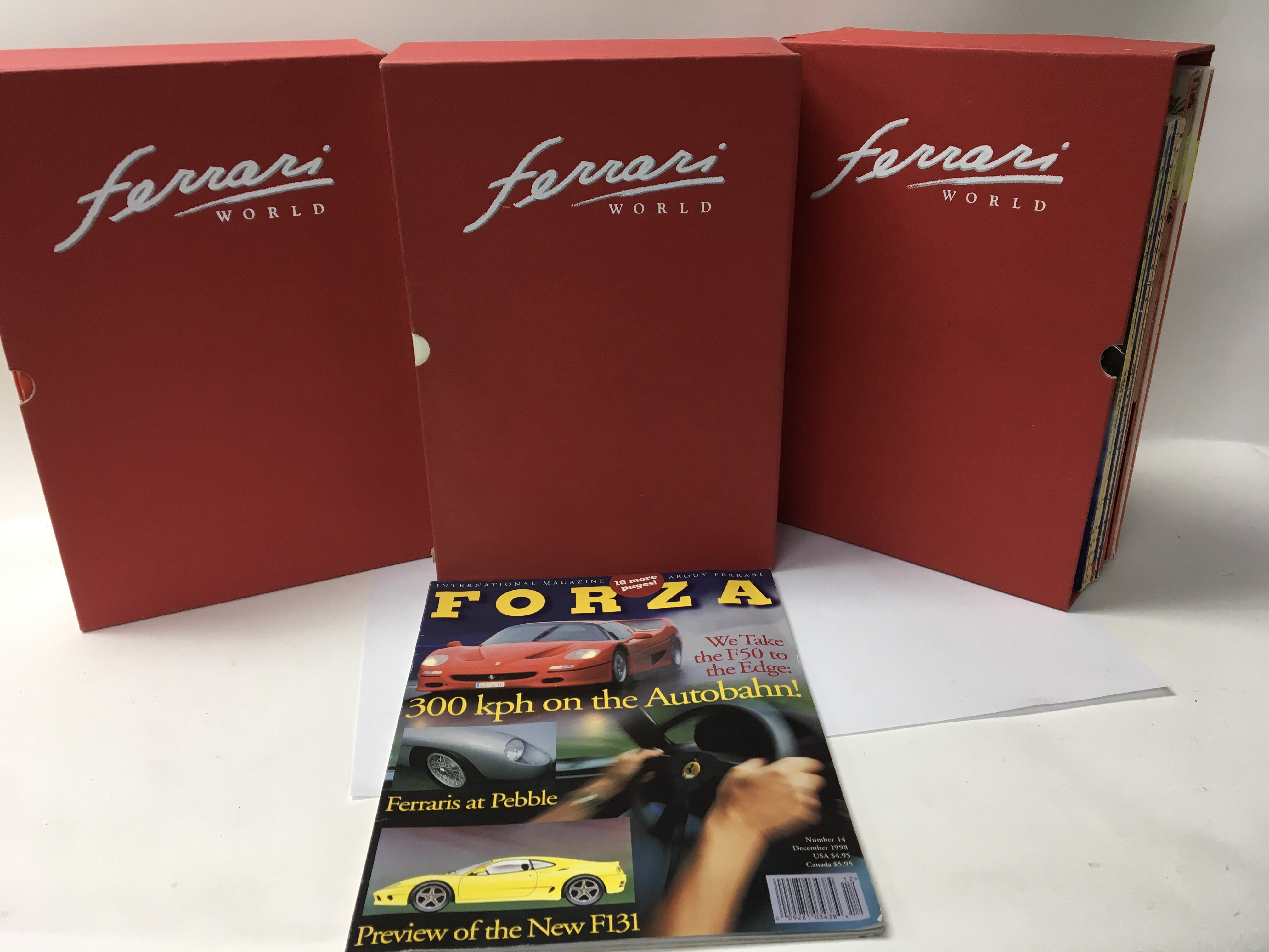 3 file boxes of the Ferrari World “Forza” magazine.