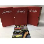 3 file boxes of the Ferrari World “Forza” magazine.