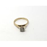 A Yelow gold ring set with a solitaire brilliant c